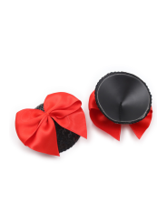 cache mamelon et nipple noir, forme ronde  avec noeud papillon satin rouge