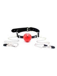 baillon avec boule à trous et 2 chaines avec pinces tétons de la marque Dreamy Fetish, accessoires Bdsm